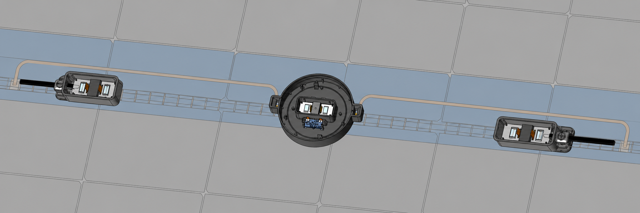 Split junction box set on the module backside — the round center box holds the sensor, CAD view